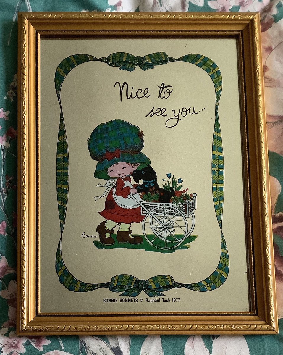 This is a FABULOUS #Vintage #WallHanging in my #etsyshop RARE #Vintage #1977 #BonnieBonnets 'Nice to see you  ...' #FramedMirror By #RaphaelTuck - Cute #HollyHobbieStyle Girl & Dog Design #70sDecor etsy.me/3olzQwk
