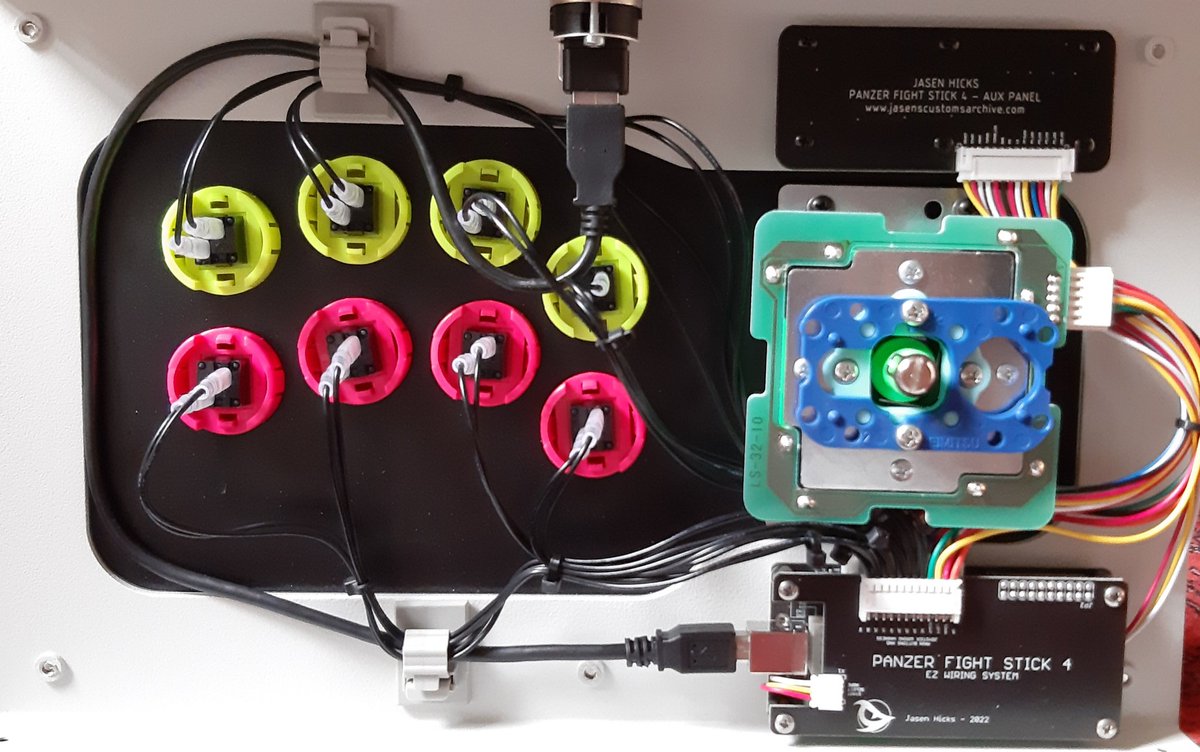 Ogamisugizo's tweet photo. One of my new @JasenHicks @JasensCustoms #pfs4 stick👍. I added silver Alu bezel, aux buttons and gasket. I use jasen's integrated pico fighting board. Thanks to the new ez-build system, wiring is still very clean but access is also much easier! Seimitsu ps-15 keiko and ls-32 https://t.co/CfG417CiRG