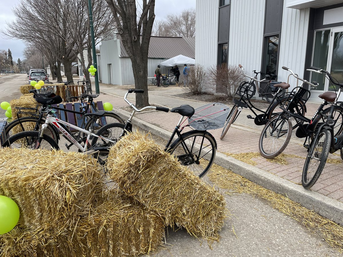 Strawbale-protected curbside bike parking. Altona, Manitoba