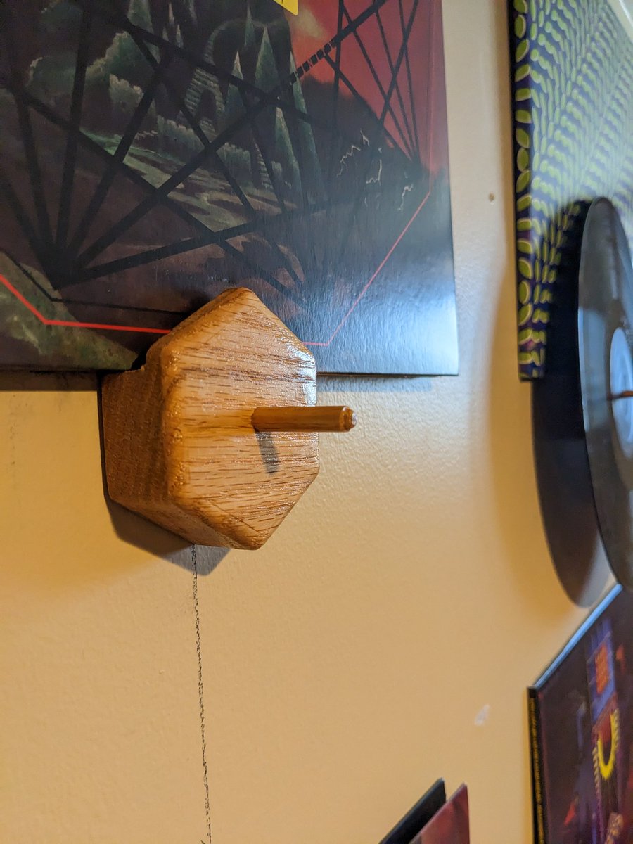 jmauser's tweet photo. I've been wanting a way to display some of my colored vinyl with album art, but not finding what I want. I designed these little wooden mounts that hold album sleeves on a small ledge and the LP itself on a wooden dowel. Now you can see both!

#vinyl https://t.co/Y25EJ2bzWd