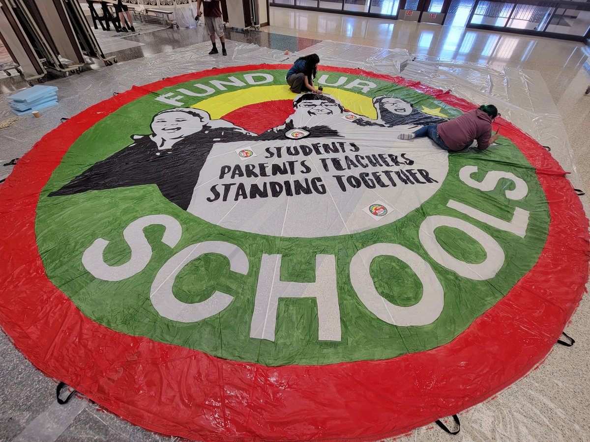 Our kids can't wait! Spend the surplus. We're putting the finishing touches on this glorious 24-foot parachute banner calling on the Wisconsin State Legislature to direct the $7.1 billion #WIbudget surplus towards public education.
