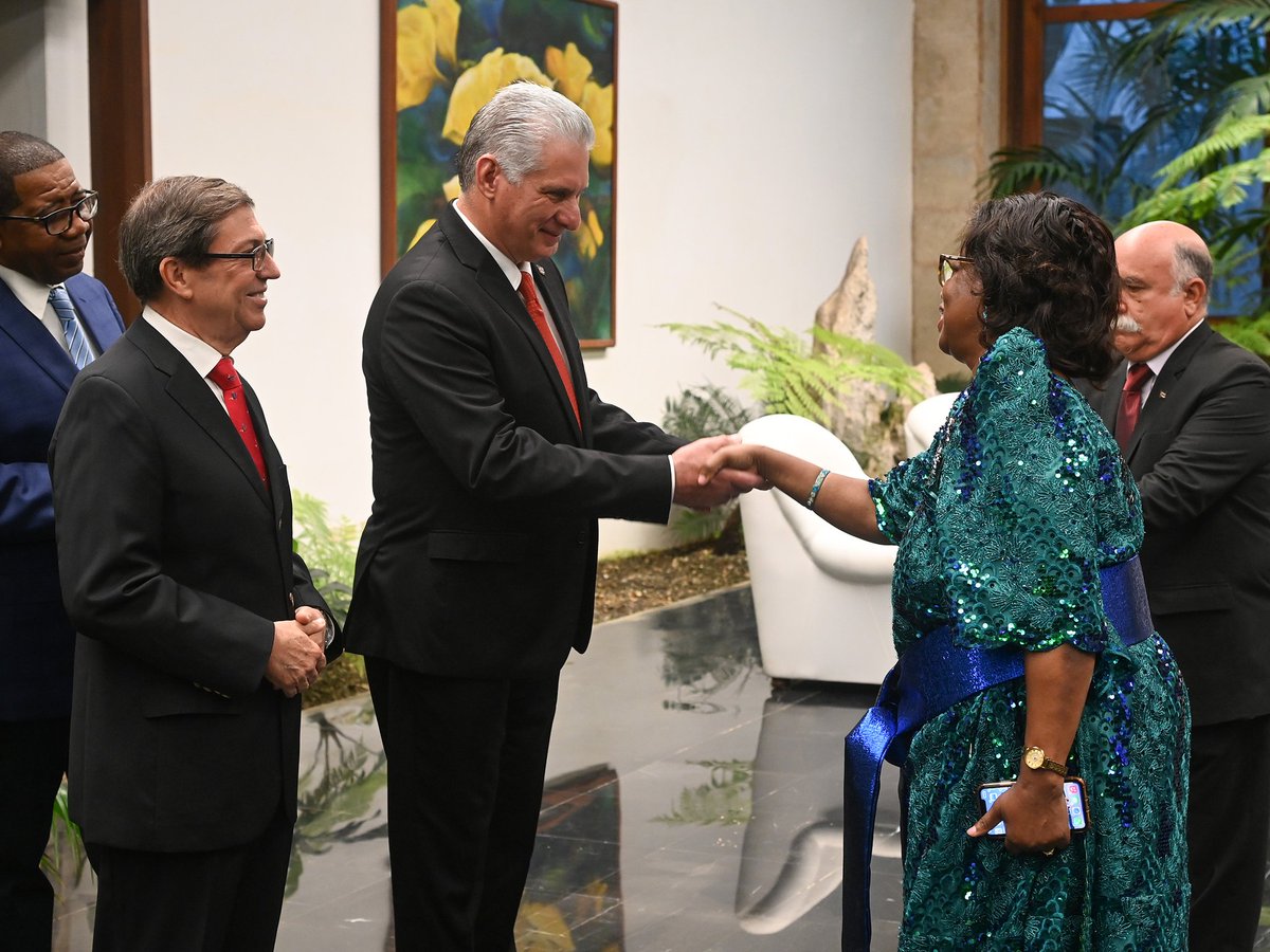 AlexMaserekaJ's tweet photo. H.E Elizabeth Musaazi greets Cuba's president @DiazCanelB after presenting her letter of credence as ambassador of Uganda to Cuba. She is daughter to IK Musaazi, that historic figure we studied about in SST. https://t.co/QLN6QPqbmp