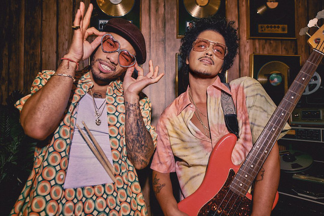 Today in 2021, <a href="/BrunoMars/">Bruno Mars</a>, Anderson .Paak and <a href="/silksonic/">Silk Sonic</a>'s "Leave the Door Open" reached #1 on the Hot 100. It later won four GRAMMYs.