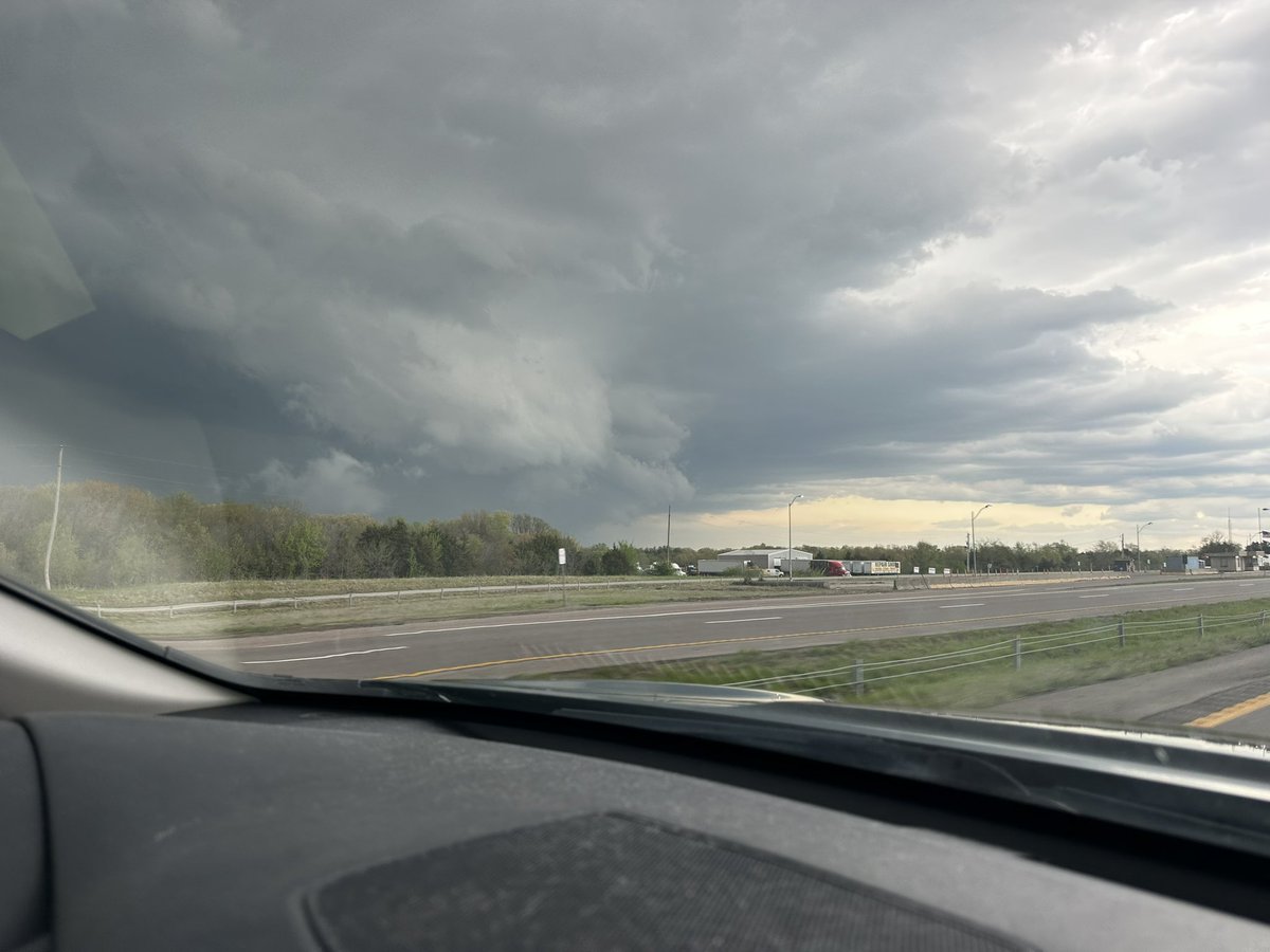 Developing wall cloud near St. Clair, MO. Rapidly organizing supercell.
