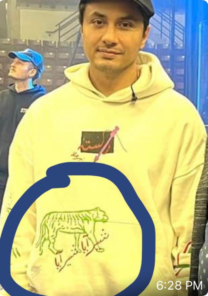 siasatpk's tweet image. Ali Zafar wearing PML N lion (Sher) hood shirt at the rehearsal of his musical concert in Canada