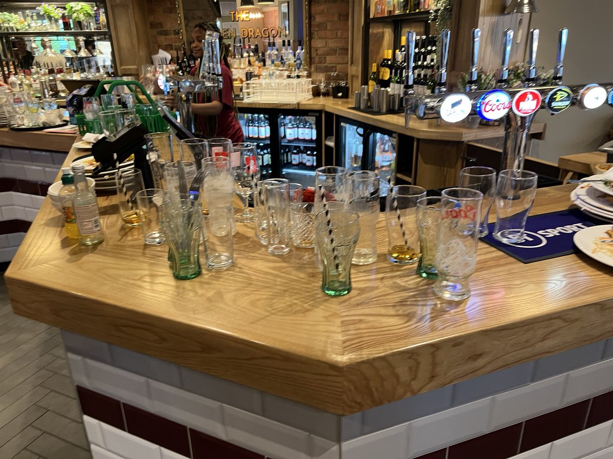 bunji82's tweet photo. @brewersfayre shambles today in Milton Keynes  Willen - three friends and I cleared 100 glasses and 100 plates from the outside as no one could be bothered….. and none were ours! Asked the staff and they couldn’t have cared less. https://t.co/y99p2RqI4P