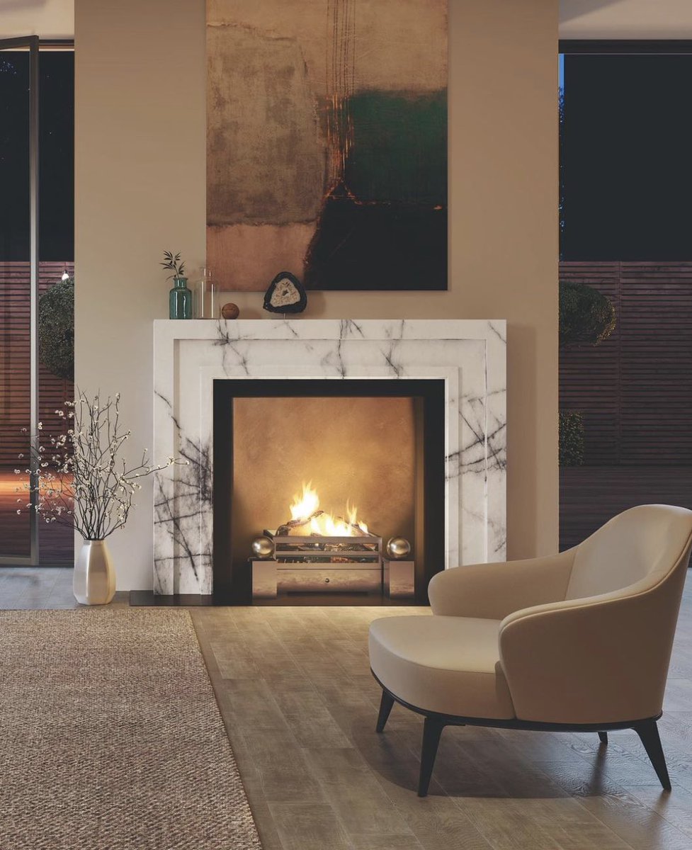 The Manhattan Luxe is one of the most popular fireplaces in our Contemporary Collection. The design epitomizes simple architectural form and is ideal for showcasing a range of luxury marbles and stones that show off their unique patterns, colours, and textures.

#chesneys