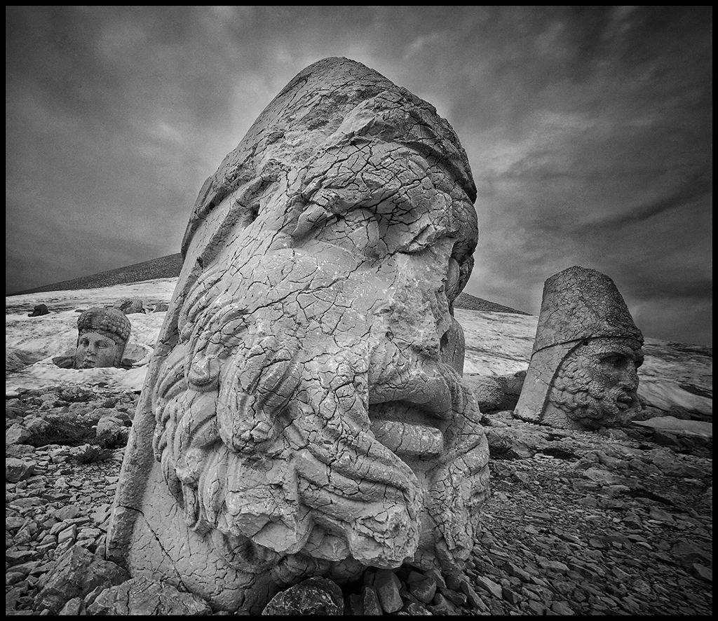 High in the Taurus Mountains in central Turkey lie the ancient burial grounds of the kings and queens of the Commagene Kingdom. Chris Rainer traveled to these ancient lands to photograph the 2,000-year-old ruins found windswept on Mount Nemrud. ow.ly/rluh50NVFwP