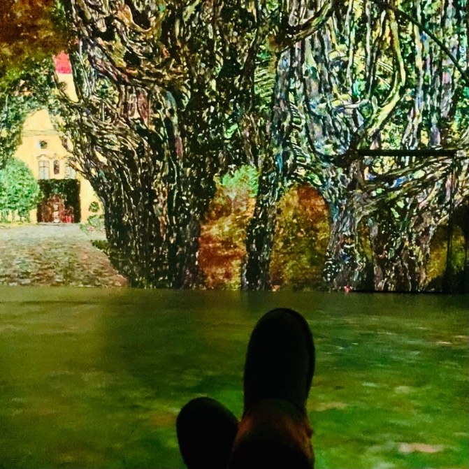 Sprawled on a fatboy pillow at Klimt show for second loop. I wrote several flash stories on way to exhibit. The person I came with fed me vss prompts until we found each other. #sundayvibes #SundayFunday #gustavklimtgoldinmotion