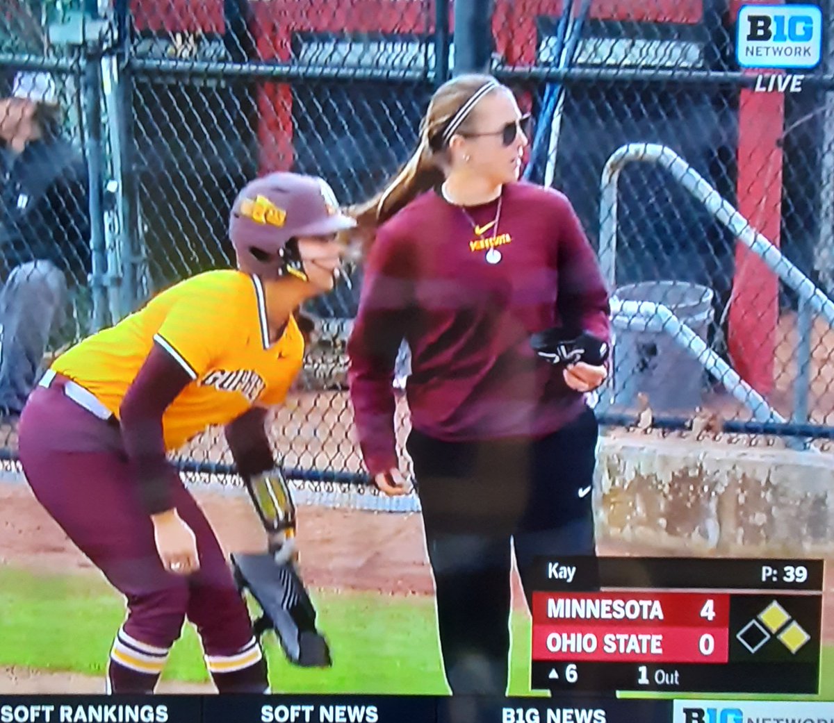 Former @shsgwsoftball player @baileyoetting09 coaching 1st base for @GopherSoftball . #GOldenWarriors #WarriorNation