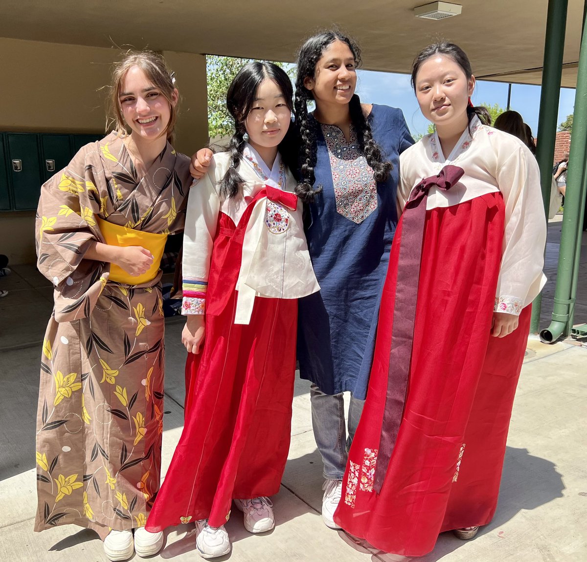 LeighHighSchool's tweet photo. On our last day of Inclusion and Diversity Week, students wore cultural attire to school to share and celebrate their diverse backgrounds! #WeAreLeigh https://t.co/fqK2AbkiZW