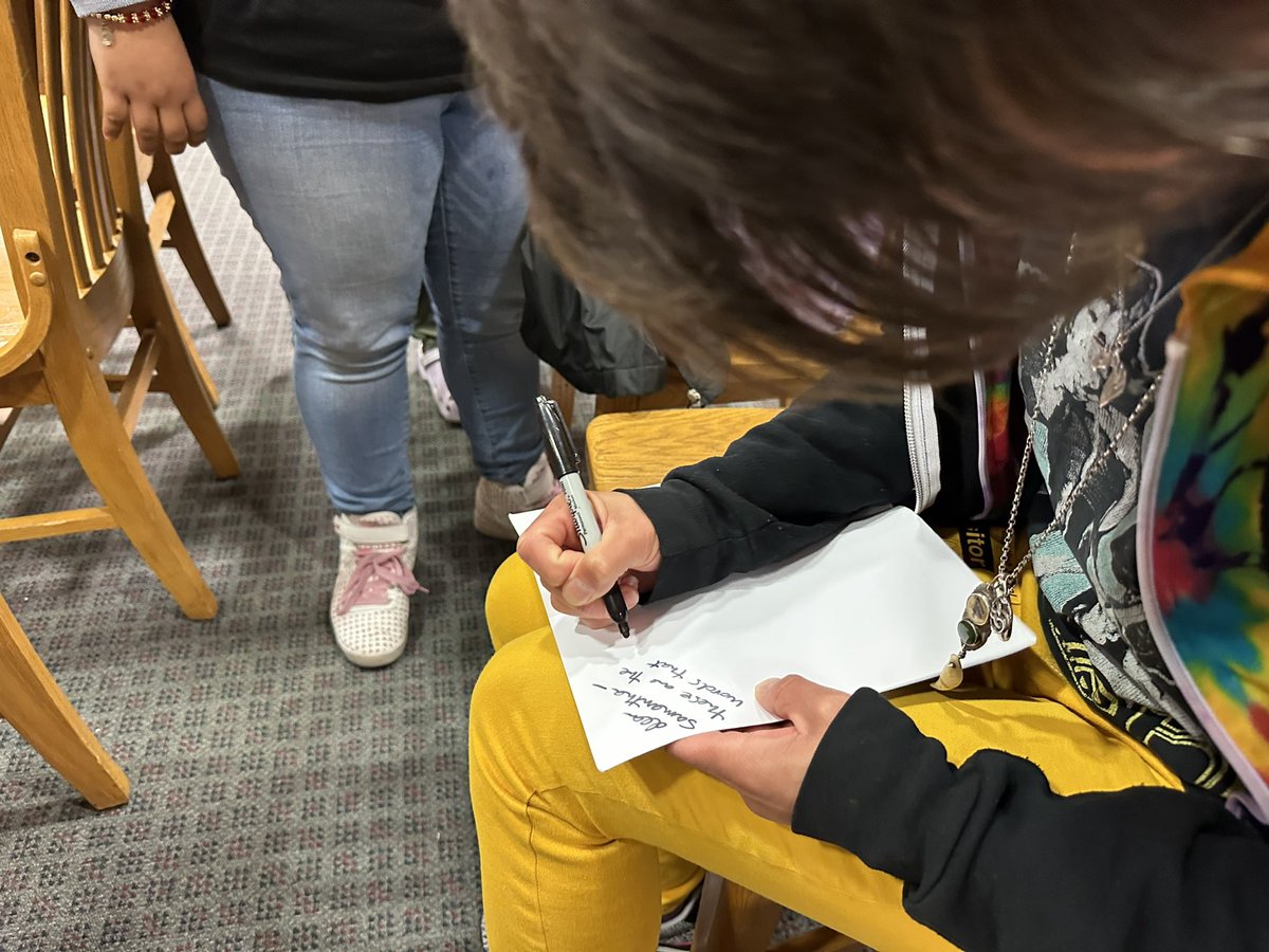MsKaraiskos's tweet photo. A full circle of poetry during today’s LICHS Poetry Slam when my current 9th grade student had her independent reading book signed by the author, who happens to be a former 9th grade student. My teacher heart is full.  #PoetryMonth #poetrylovers https://t.co/hcgEiQTLPZ