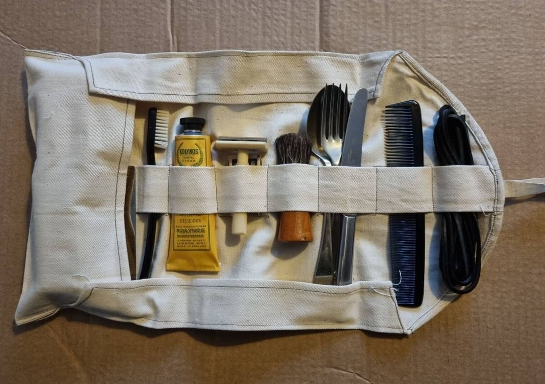 marksimner's tweet image. British Army holdall (today more commonly referred to as a wash roll) broadly representative of items typically carried late in the Second World War. Most items are original from the period, the toothpaste, shaving stick, and soap being reproductions. #WW2 #SmallKit