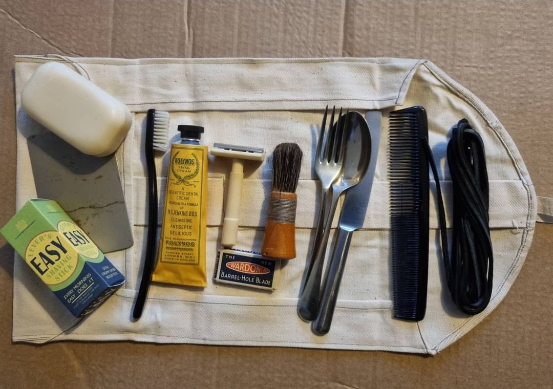 marksimner's tweet image. British Army holdall (today more commonly referred to as a wash roll) broadly representative of items typically carried late in the Second World War. Most items are original from the period, the toothpaste, shaving stick, and soap being reproductions. #WW2 #SmallKit