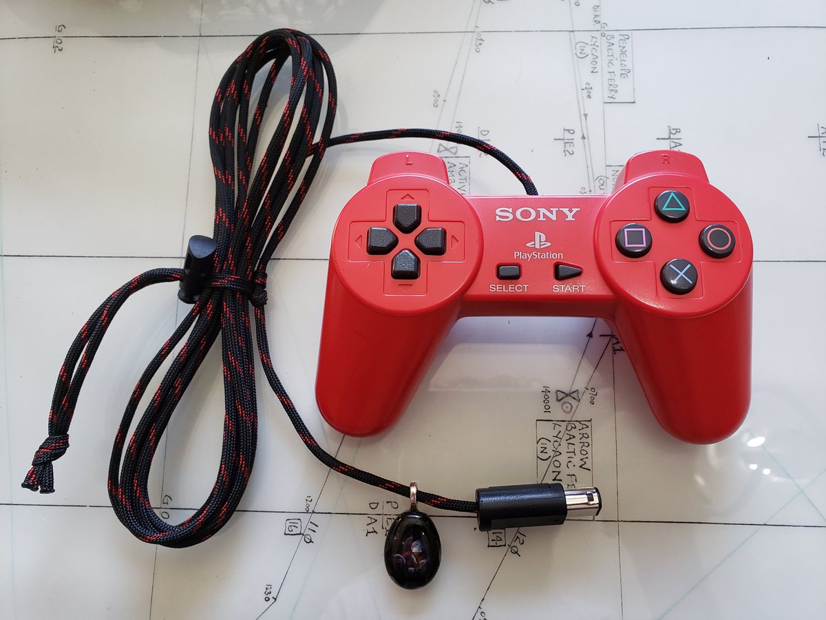 CoiledOver's tweet photo. PSframe1 

This PS1 controller plugs into the GameCube and functions the same as a Boxx 

-3 M GCC paracord cable
-Hand blown glass pendant

$285 shipped https://t.co/iPyPzT3U6o