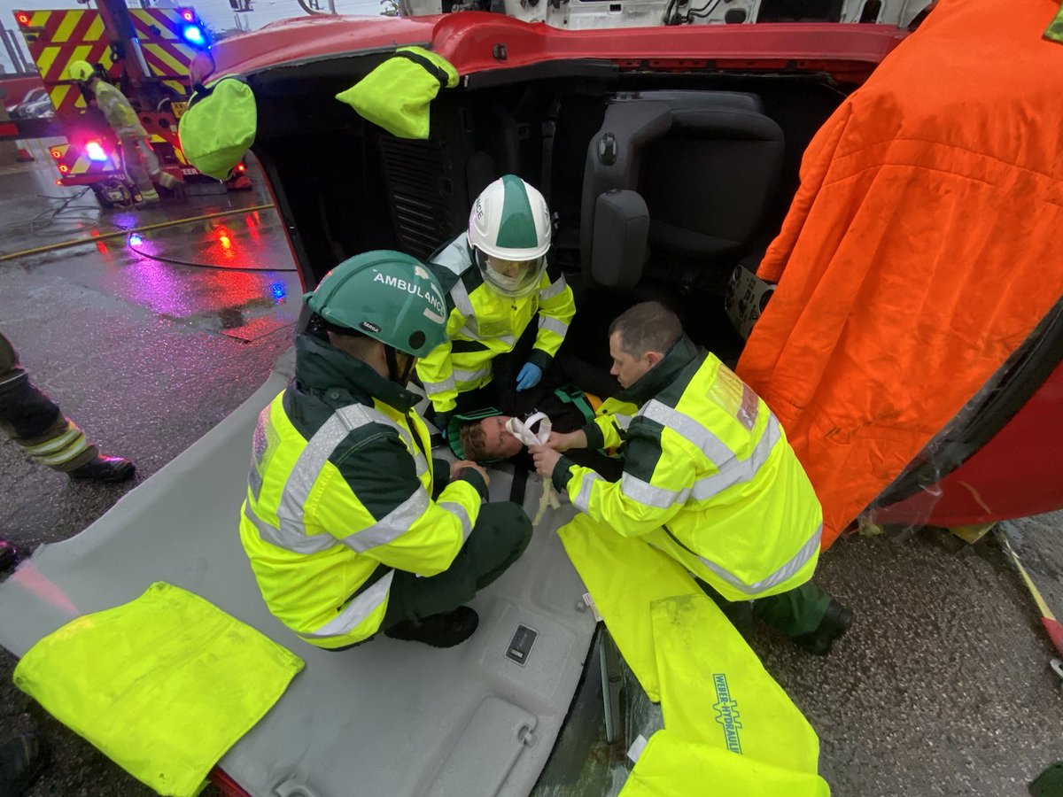 Batch596's tweet photo. Rather wet but valuable training event with @EEAST_Henlow supporting RTC sessions with @BedsFire. Tricky extractions and introduction to kit &amp; capabilities for new team members. Great experience for all. @EastEnglandAmb #V4 #NotRainingNotTraining https://t.co/EHEpdxUs7k
