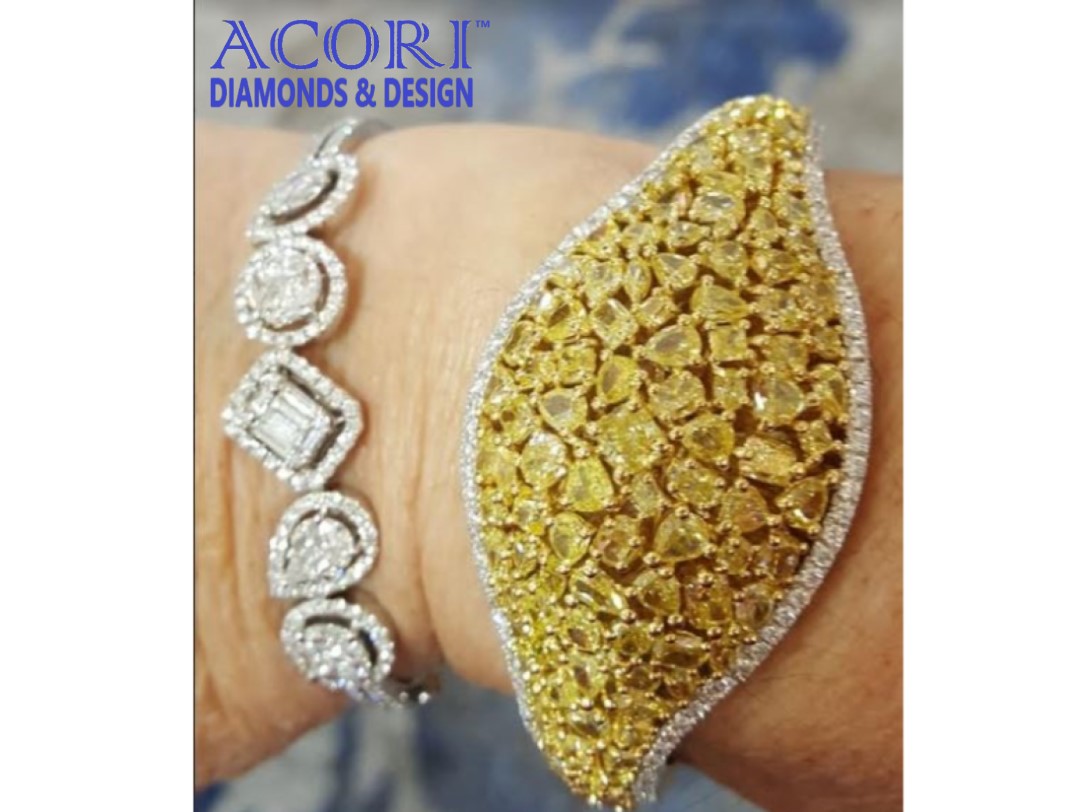 I love bracelets, love stacking them.  The sun shines everyday when you are wearing this amazing natural yellow diamond bracelet.  Have a sun shiny day