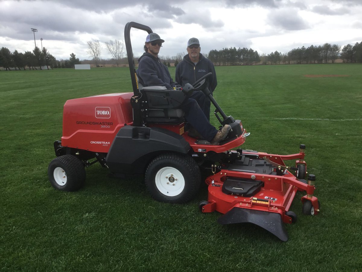 Kevin Hazel (standing) head groundsmen and operator Dylan
from Albion Central School District in New York are very happy to check out the new Toro Groundsmaster 3200 AWD. Thank you for the business!!