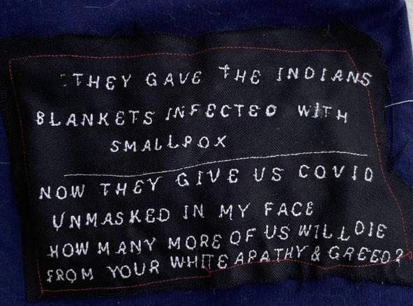 DEC0L0NIZE's tweet photo. they gave the [natives] blankets infected with smallpox

now they give us covid unmasked in my face how many more of us will die from your white apathy &amp; greed?

p.s. please tag the artist behind this shirt. https://t.co/hGyJs4B6AO