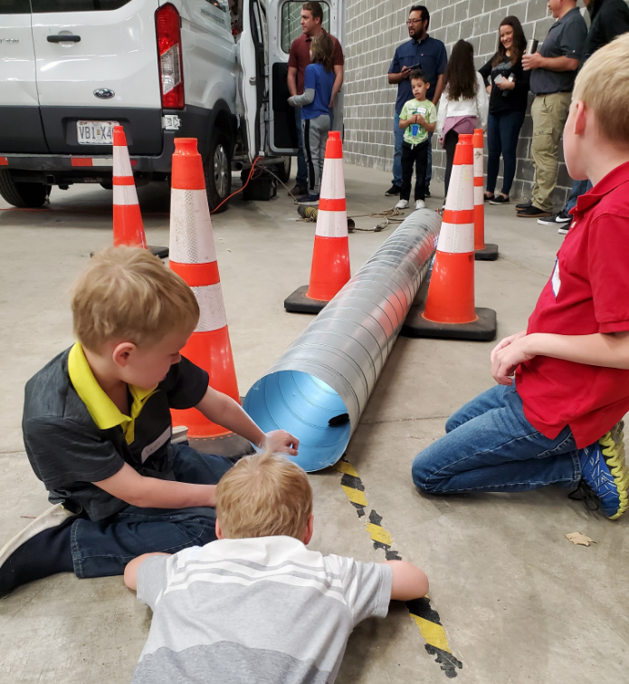 TREKKDesign's tweet photo. Our St. Louis location hosted its first Bring Your Parents to Work Day (also known as #TakeYourChildToWorkDay), and it was a huge success! The kids had fun operating CCTV and PreView cameras, making maps, racing marbles and launching rockets. #TREKKfamily  #ImprovingLives https://t.co/Gz1ruDCK1I