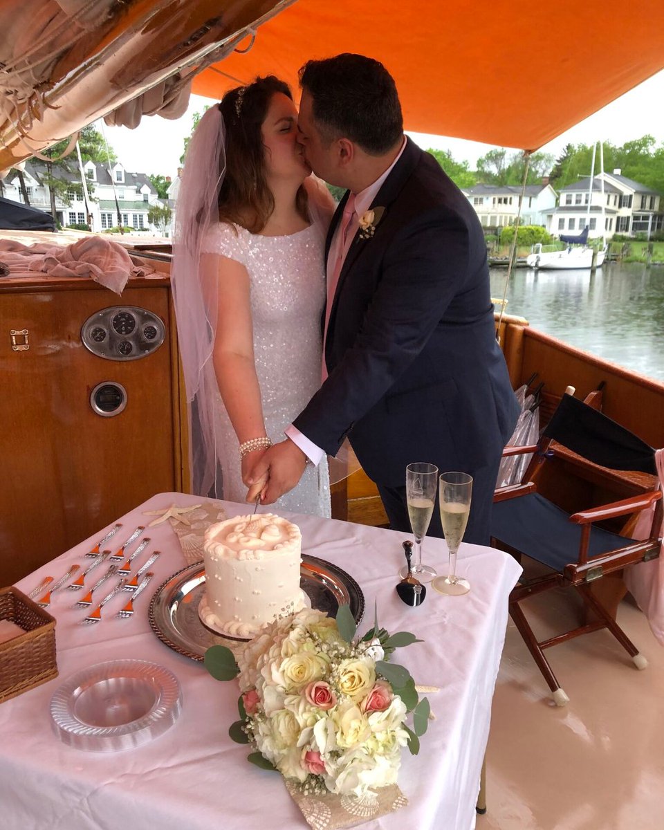 SailStMichaels's tweet photo. "Rain or shine, what a stunning and intimate setting for your wedding day, where moments like these, under the awning in the rain, become unforgettable memories that will last a lifetime - #intimatewedding #oceansetting #rainorshine #unforgettablemoments #weddingmemories" https://t.co/dhVLIMIZ7C