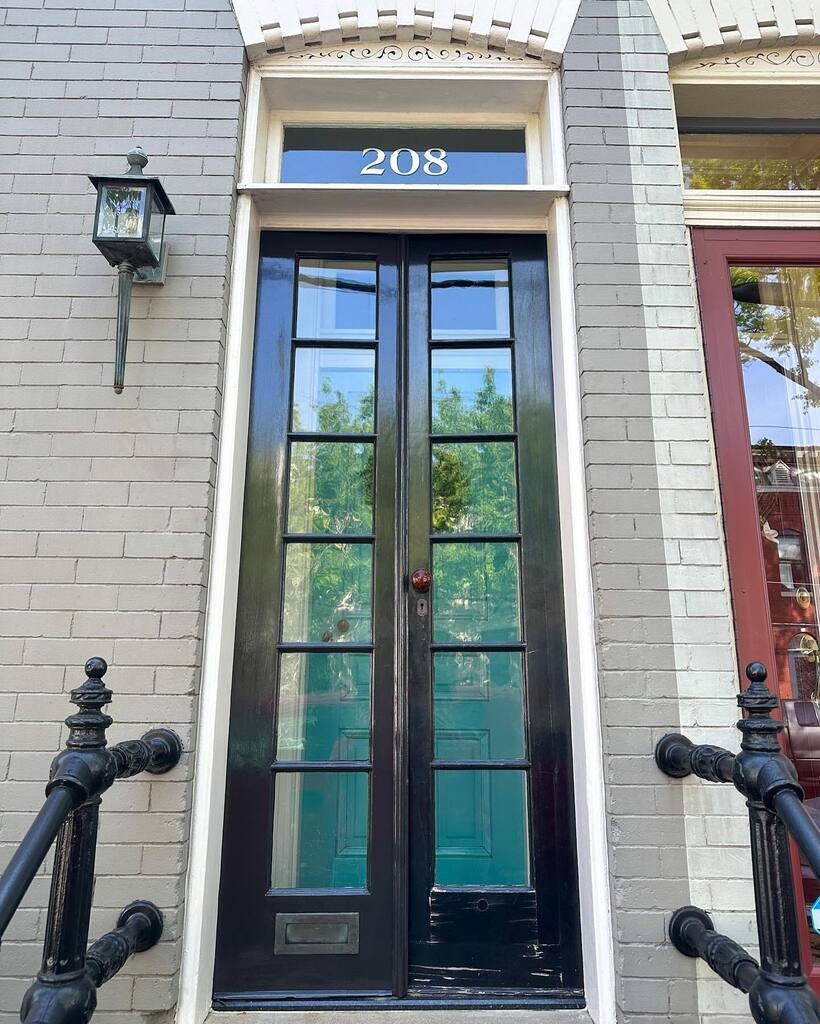 Work in progress! Half way done. The left door is repainted using Benjamin Moore Advance high gloss in Onyx. The door on the right is looking a little worse for wear. 
•
We built these French doors from salvaged sidelights in 2012 and have loved them… instagr.am/p/Crlx1GYp0xF/