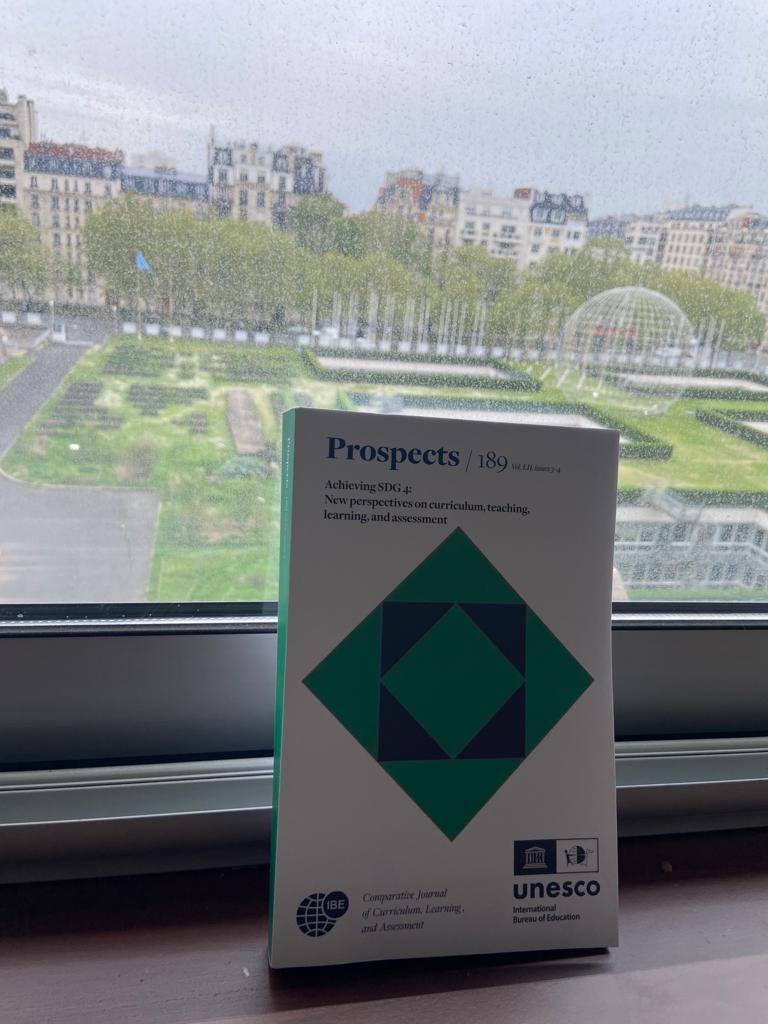 Just caught a glimpse of @IBE_Prospects sitting pretty in a @UNESCO window display overlooking Paris, like it's got all the answers. Who knew an academic journal could hold so much power? @IBE_DocCenter