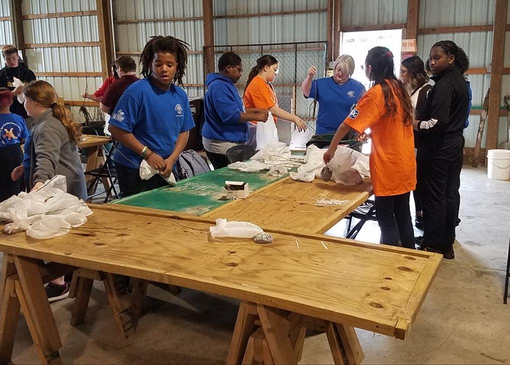 CVOHIO's tweet photo. Members of the Kiwanis in addition to members of the Aktion Club  the Key Club ; the Builders Clubs of South, Liberty and Heir Force; and the K-Kids Clubs of Heritage, Unity, and Freedom; and others bagged 1,352 trees which were given to each first grade student in the County. https://t.co/QMx4UvE8H9