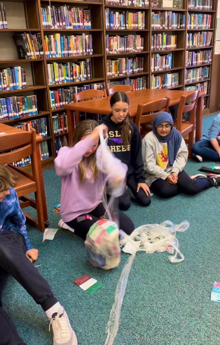 Ms_Stanco's tweet photo. On Monday Italian Club played a game where each student got to unravel a saran wrap ball with prizes! If they got an Italian flag during their turn, they had to answer a trivia question about Italy. A correct answer gave them more time to roll, and a wrong answer ended their turn https://t.co/jBjzX7MWQZ