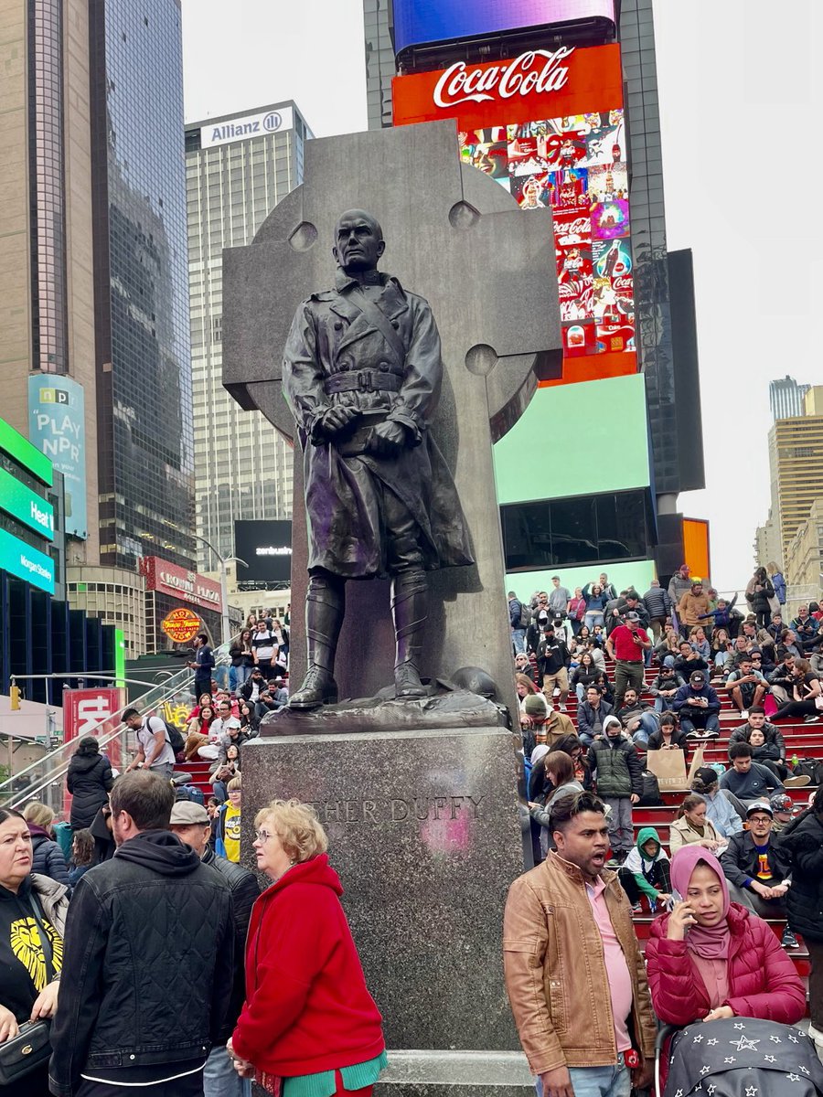 One of my heroes of the Great War (WW I) - Father Duffy lost in the crowd on Broadway in NYC