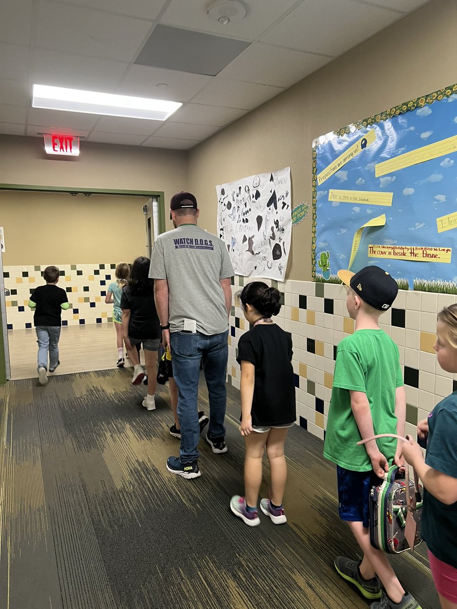 MsACheetahClass's tweet photo. Watch DOGS (Dads of Great Students) is a wonderful program we have on our campus. The students really love having the DOGS hang out in our class as we learn! Here’s one of my students and his DOGS modeling great hallway expectations! @CimarronElem #CECheetahs #positiverolemodels https://t.co/BsNrVvQ5ce