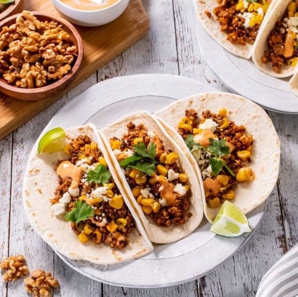 It's time to taco 'bout Cinco de Mayo! 🌮🍹 Let's gather around the table & enjoy the smoky flavor of these vegetarian #tacos with our loved ones. 💚 Get the recipe: bit.ly/3Np1K5q #haveaplant @CaWalnuts