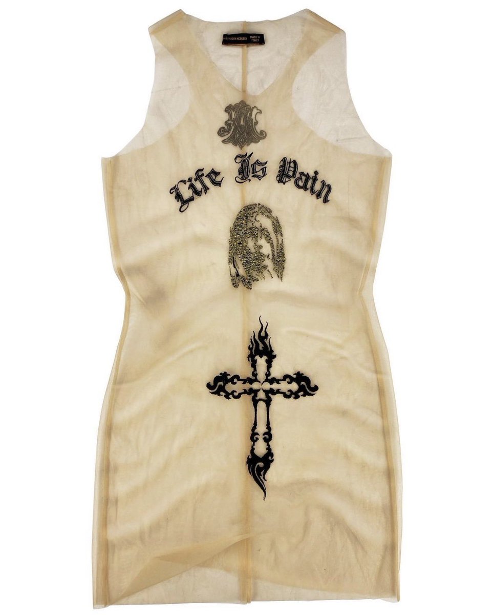 geminoiir's tweet photo. Alexander McQueen: 'Life is Pain' Mesh Tank-Top Autumn/Winter 1996 https://t.co/fVo0QdpNND