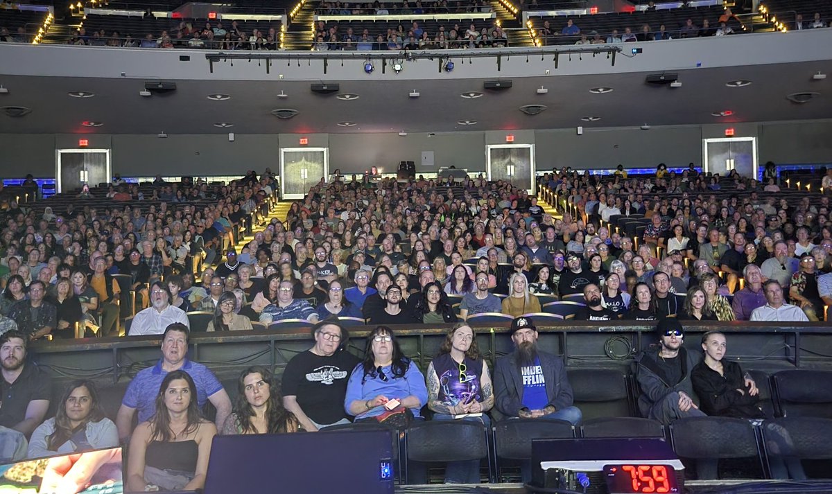 Tsoukalos's tweet photo. CHARLOTTE! What. A. Blast! Thank you for joining us tonight for an evening of exploration and adventure. You shook the venue walls with your cheers which we felt deeply within our cores. Thank you for the incredible welcome. TYSONS VA we'll see u tomorrow Sat! #AncientAliensLive https://t.co/BUvMuZw59N