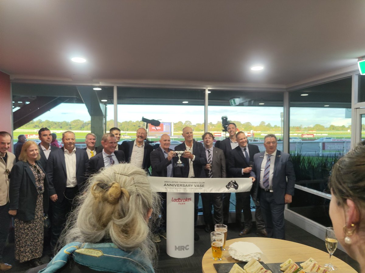 Connections of Cardinal Gem celebrate the win.