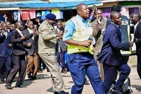 PicotyChelangat's tweet photo. #OneTouchFromJesus our police are born again preparing for rapture. 

#SomeoneTellKhalwale that he should look at this pictures. 

From valleys to mountains God hear our praises. https://t.co/6JPyRJW0bm