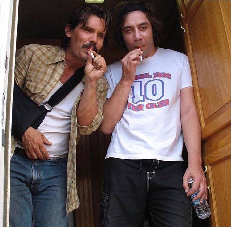 Javier Bardem and Josh Brolin on the set of NO COUNTRY FOR OLD MEN (2007).