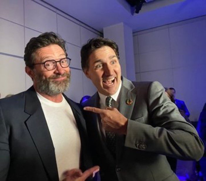 BlakeRichardsMP's tweet photo. Celebrity actor Hugh Jackman, pictured here with an over-zealous fan who is obviously skipping out on very important work to fan-boy in New York. https://t.co/knjokq7sQ5