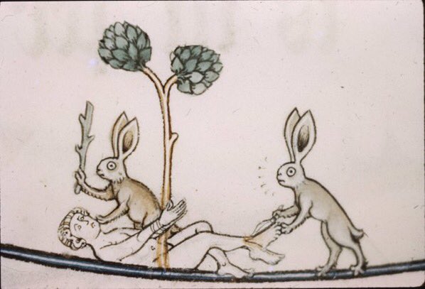 A medieval drawing of two rabbits brutalizing a naked man