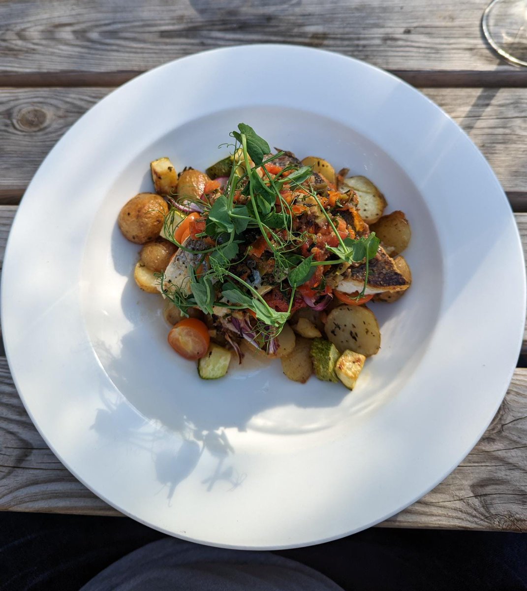 One of the new items on our summer menu! This is the pan fried fillet of sea bass with Mediterranean vegetables, roasted new potatoes and tomato &amp; olive dressing 😋 yum!!