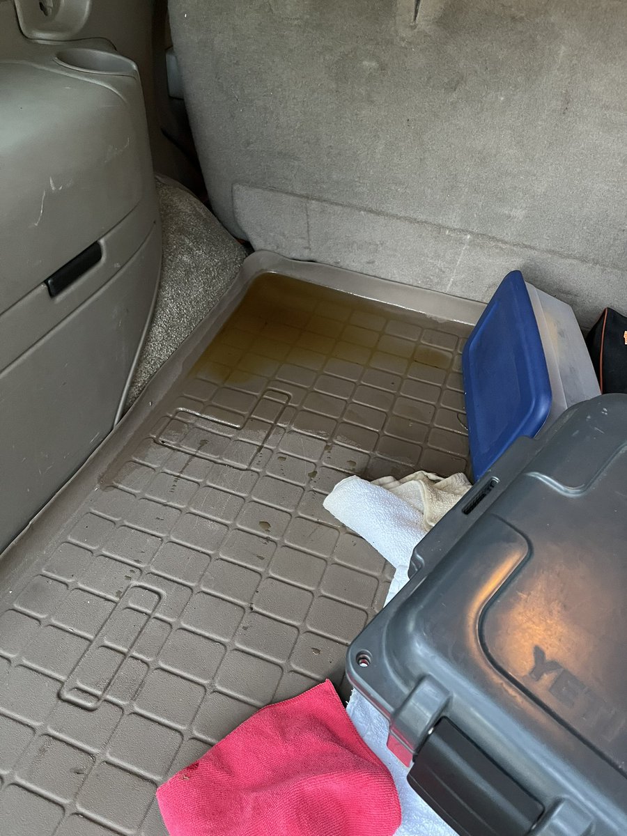 ARodeffer's tweet image. So pleased I bought this @WeatherTech mat for my Tahoe several years ago. When a gallon of oil topples over with a loose lid and almost the entire gallon spills but it doesn’t ruin the back of your car…..  #winning