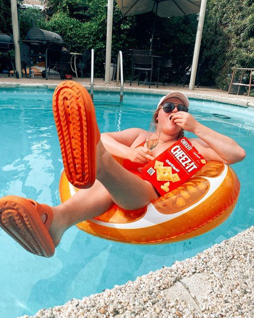 'Summer goals: chilling in a pool floaty, snacking on Cheez-Its, and wearing the comfiest slides ever!' - Jessica (San Francisco, CA) ☀️ #CloudSlides #PoolDay #SummerVibes