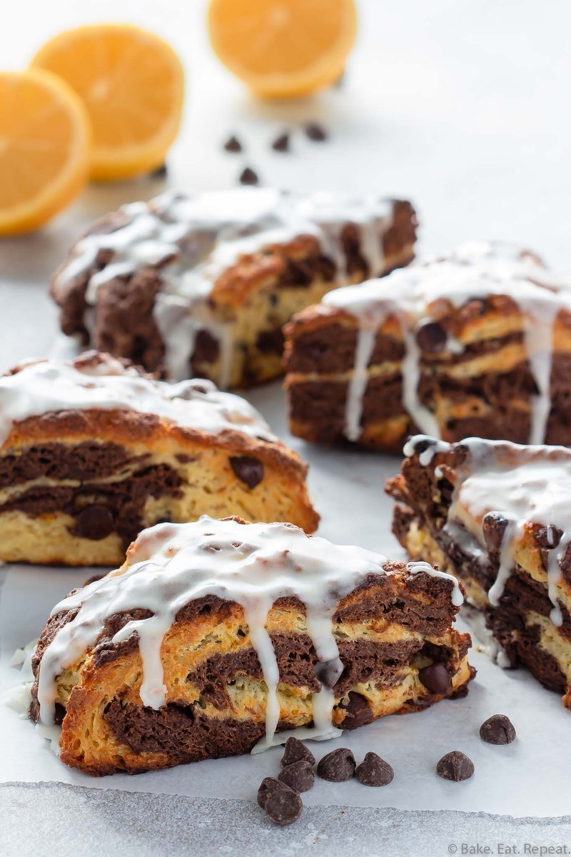 These marbled chocolate orange scones with a sweet orange glaze make the perfect sweet treat with your morning coffee! Get the recipe: bake-eat-repeat.com/chocolate-oran…