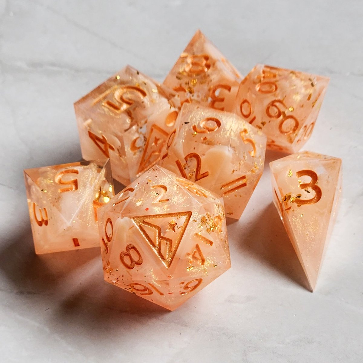 ArcaneHallows's tweet photo. Sweet little peachy babies. Available tomorrow! #handmadedice https://t.co/O1d9ciKsz8