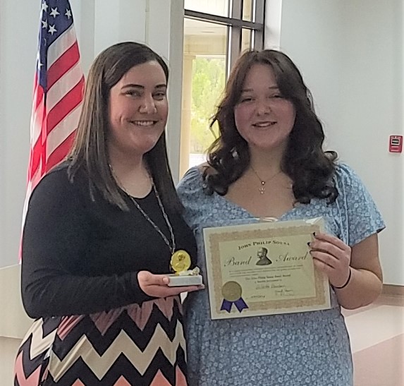 CVOHIO's tweet photo. Blaine Cochensparger (left) of Allen East and Juliette Duncan (right)of Bath were awarded the John Phillip Sousa Band Award by the Kiwanis Club of Kiwanis of Lima Ohio  at a recent meeting. They are pictured with their respect band directors Bobby Dotson and Hannah Snyder. https://t.co/4g7t0gkekH