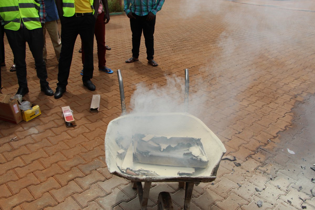 Trainees being taken through  the fire fighting training to enable them put out fire incase of an outbreak
