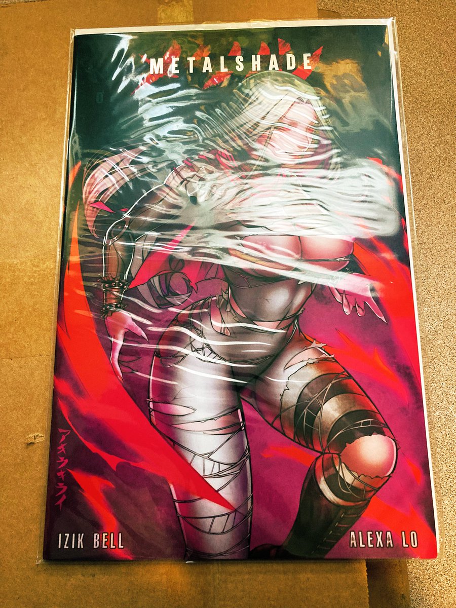 HellsSpawnWorld's tweet photo. Yesterday the mail man dropped this off for me. A copy of #MetalShade 1,2 & 0. By my buddy @insidious_izik and his lovely partner #AlexaLo. I normally don’t do Kickstarter but for their art I had to. #indiecomics #comics #IronAge #ComicsGate #comicbooks #WeWillWin #RippaVerse https://t.co/F02VgVg0J8
