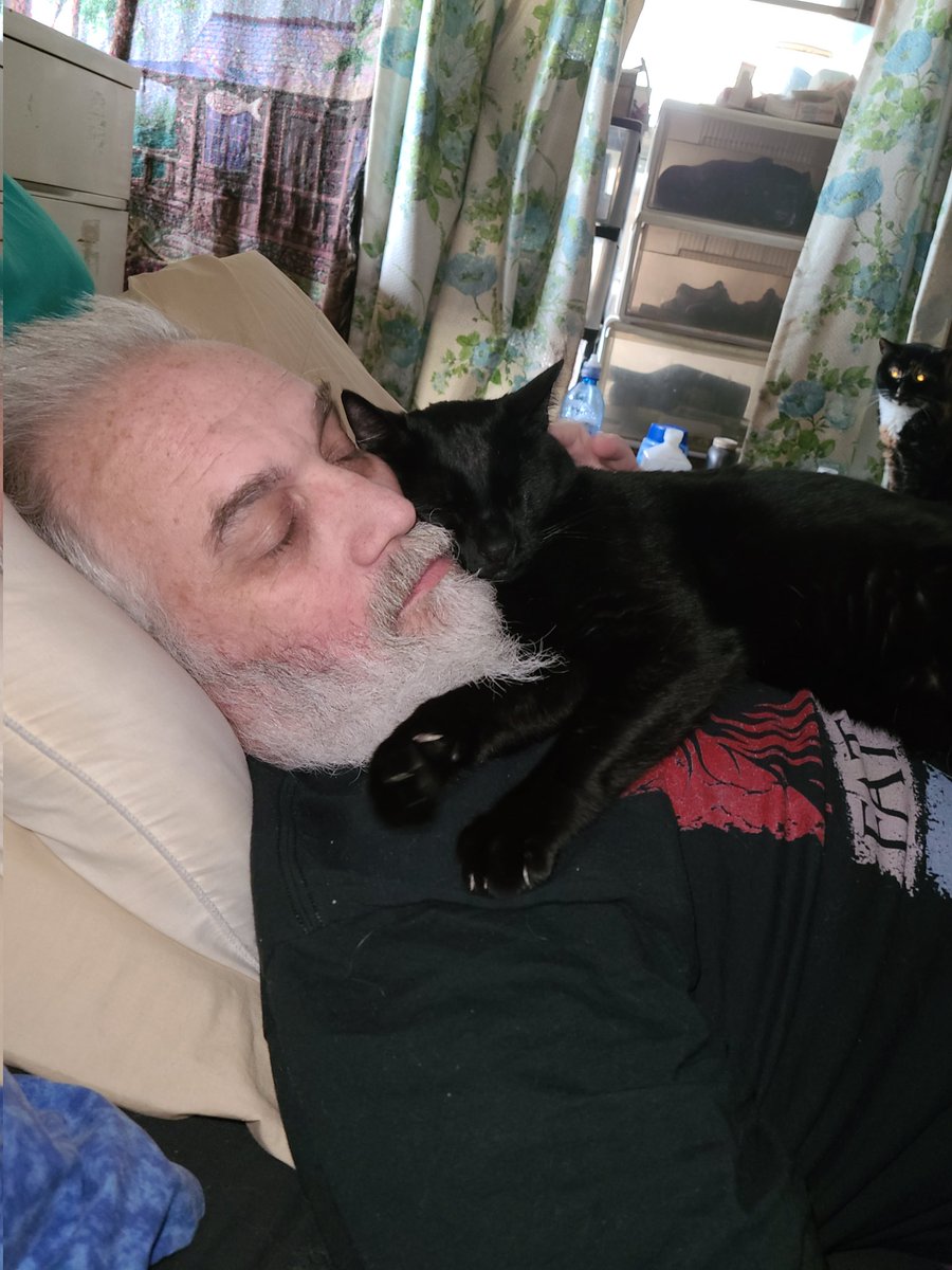 Just a man and his cat taking a Caturday afternoon nap! 💞