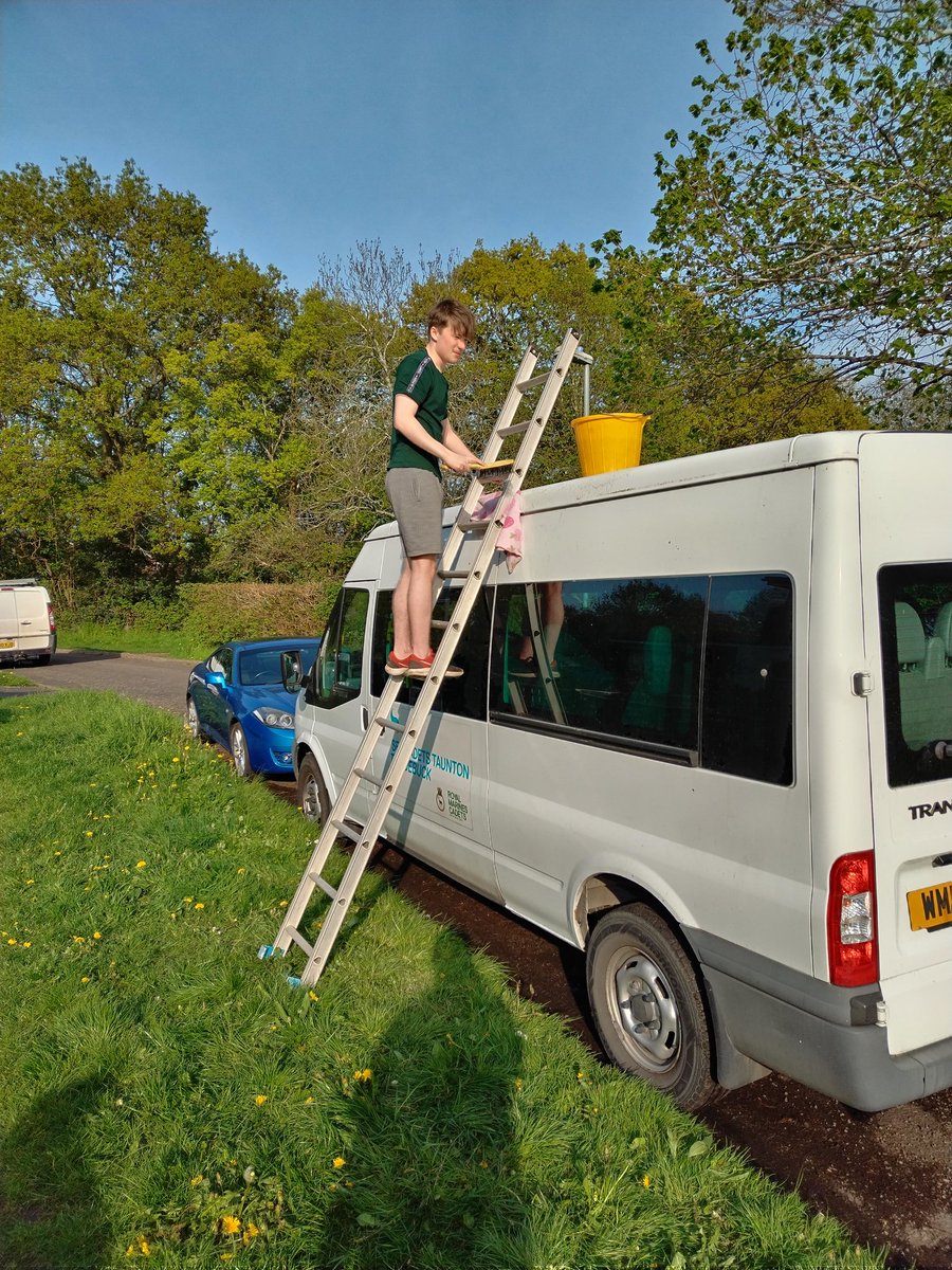 Keeping the minibus clean ready for the next trip.