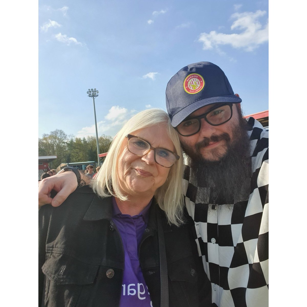 RossxPaul's tweet photo. WE ARE GOING UP!!!!

Me and my mum on the Lamex celebrating our @StevenageFC promotion!!!! 

I cannot express this feeling! We are both die-hard fans and to share this moment with her is amazing. https://t.co/CAOoZKJU5Z